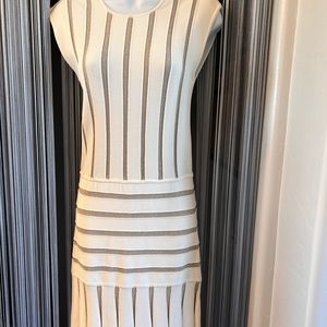 Beautiful creamy white dress with silver accents